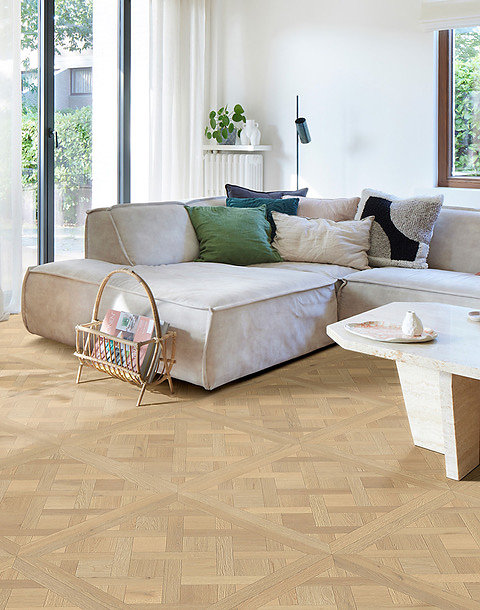 De Dynamic Versailles-vloer is voorzien van een uniek blokkenpatroon. Interfloor Dynamic Versailles woonkamer interieur rotan